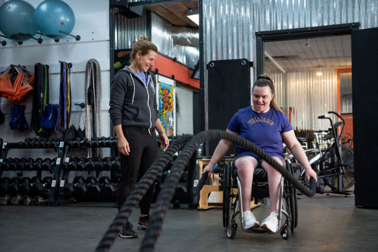 Jill training Ella on battleropes during a personal training session at The Energy Lab in Redlands, CA.