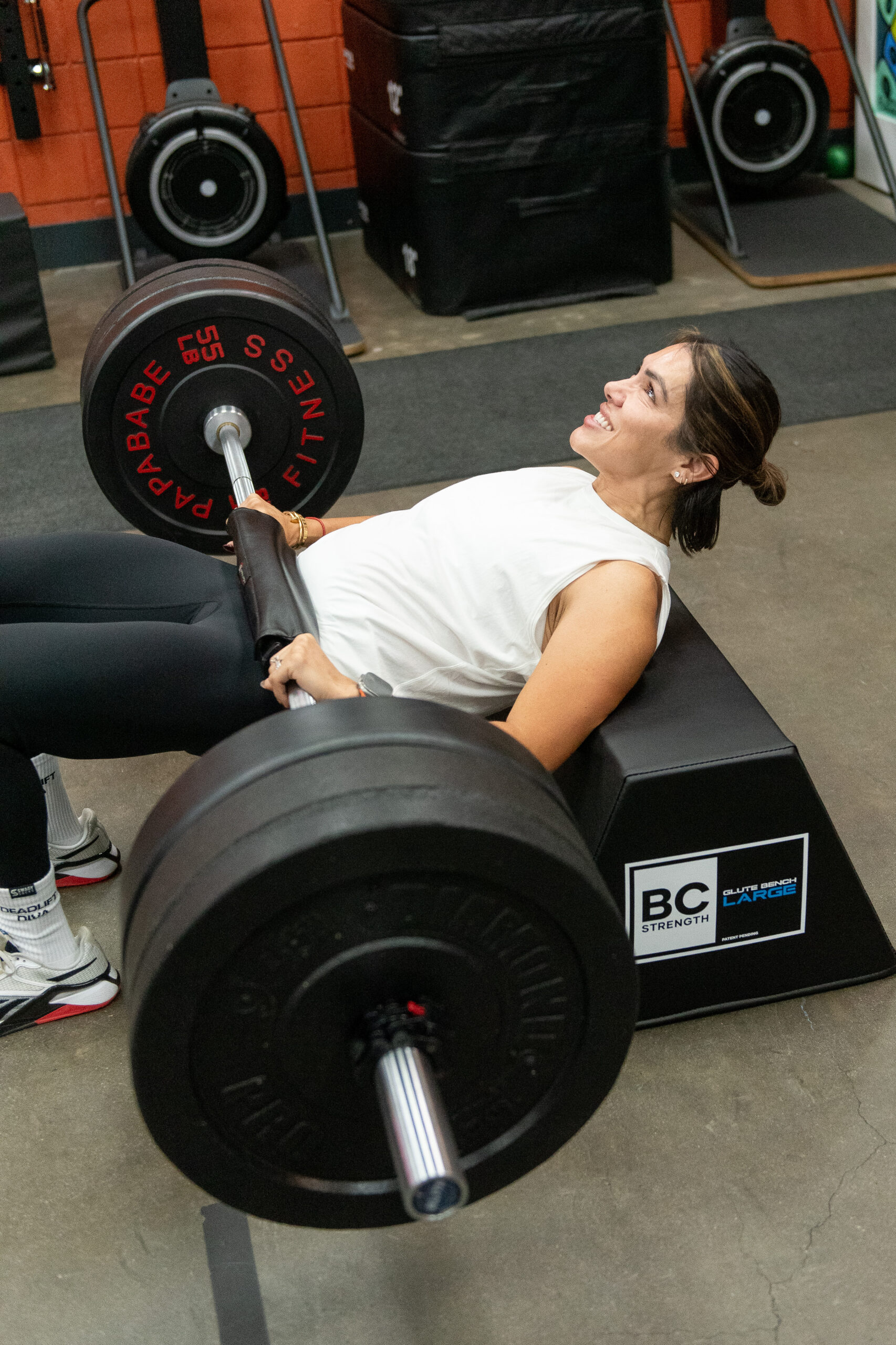 Susie doing a hip thruster exercise in Breakthrough class at The Energy Lab in Redlands, CA