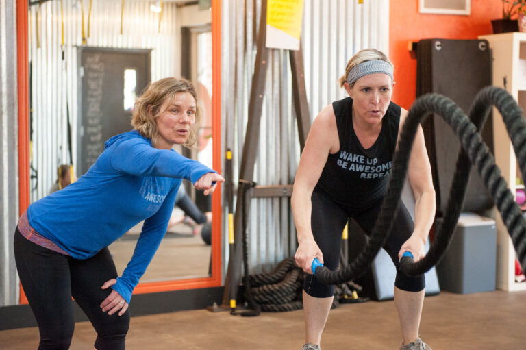 Keri using battleropes during a personal training session with Jill at The Energy Lab in Redlands, CA.