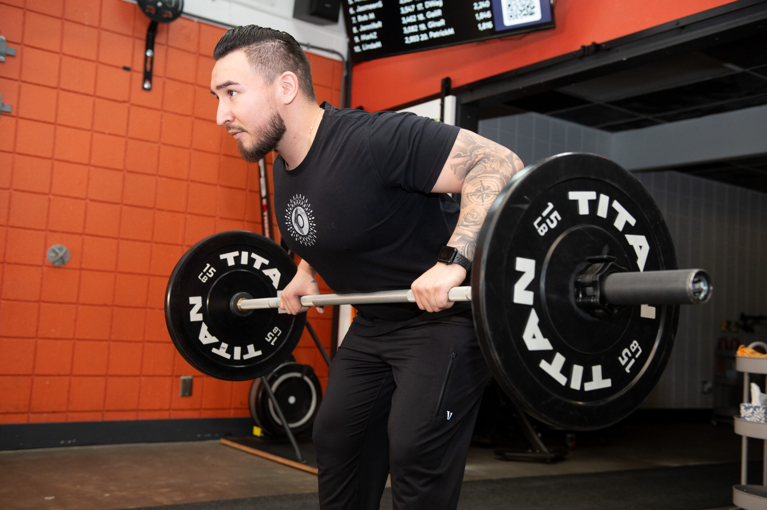 Isaac performing a standing row at The Energy Lab in Redlands, CA.