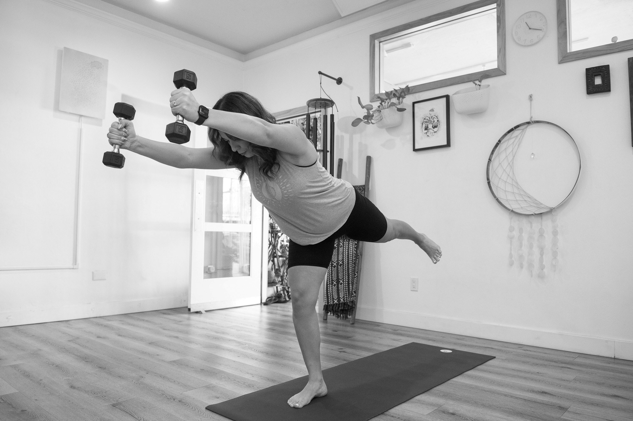 Miranda poses while teaching a Hot Sculpt class in the yoga space at The Energy Lab in Redlands, CA