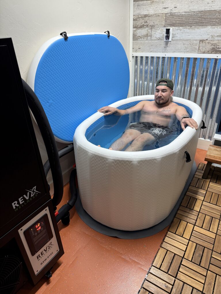 Isaac enjoying a recovery session in the cold plunge at The Energy Lab in Redlands, CA.