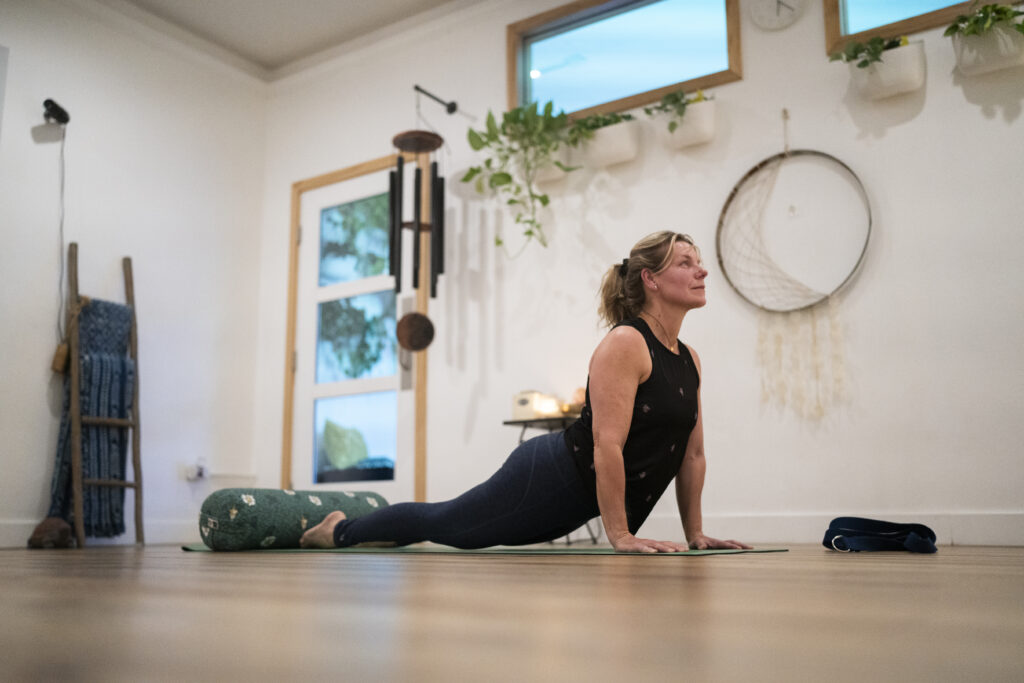 Jill stretching during a yoga class at The Energy Lab in Redlands, CA.