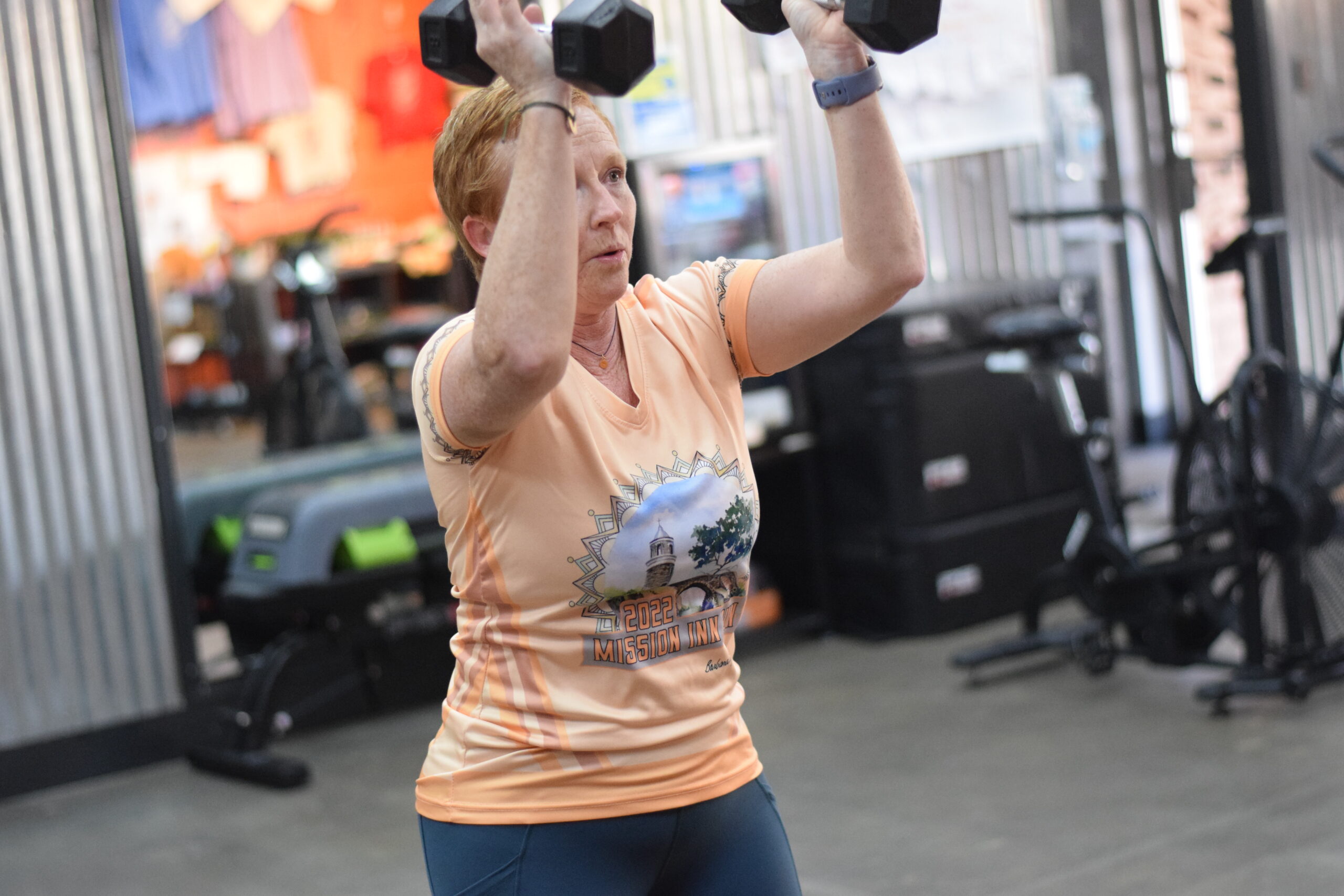 Molly lifting weights during a personal training session with Jill at The Energy Lab in Redlands, CA.