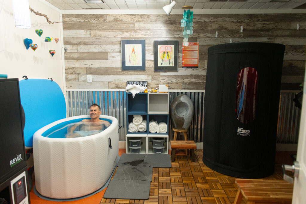 Bob using the cold plunge before jumping into the sauna in the Recovery Room at The Energy Lab in Redlands, CA.
